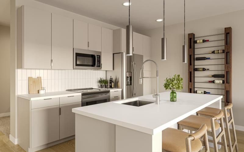 a kitchen with white cabinets