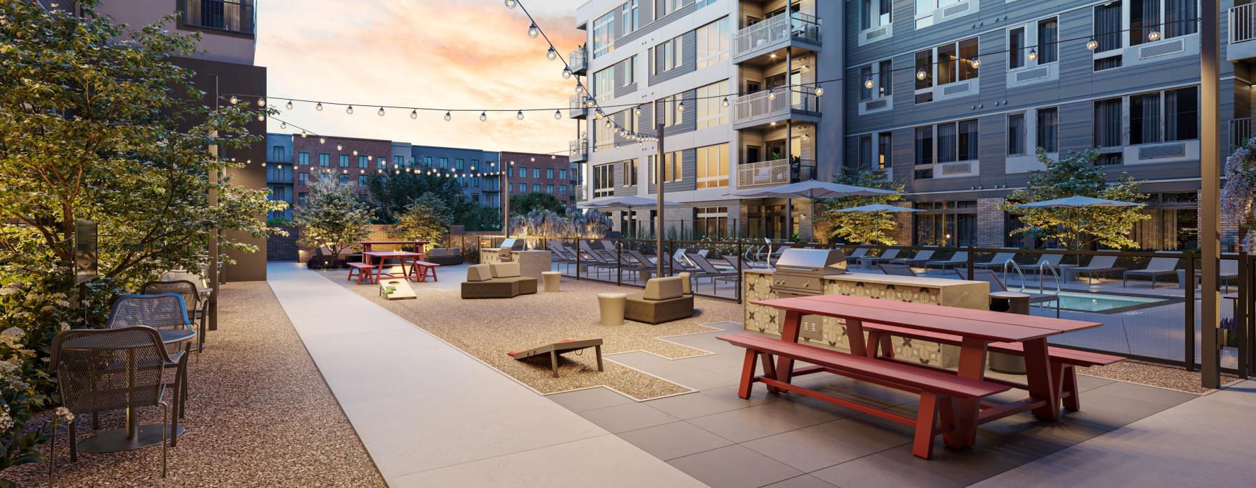 a courtyard with benches and tables